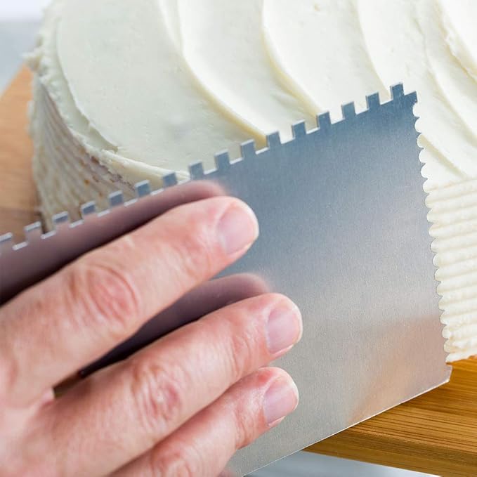Restaurantware Pastry Tek 6 Inch x 3.8 Inch Cake Scraper 1 4-Pattern Cake Smoother - Straight Edges Hanging Hole Metal Icing Smoother For Decorating Or Sculpting Desserts