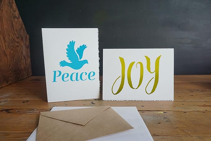 Stencil1 Holiday Greetings 4 Pack Set Stencil – Reusable Winter Christmas Template for DIY Crafts, Holiday Decor, Painting on Wood, Fabric, Cards & More - 8.5" x 11"